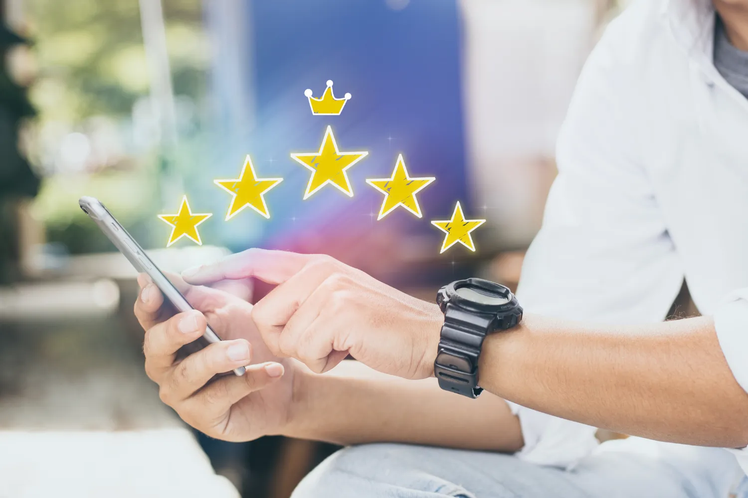 Person giving reviews on the phone Cannabis plant maturing outdoor in Nepal. Selective focus.You can find more Marijuana